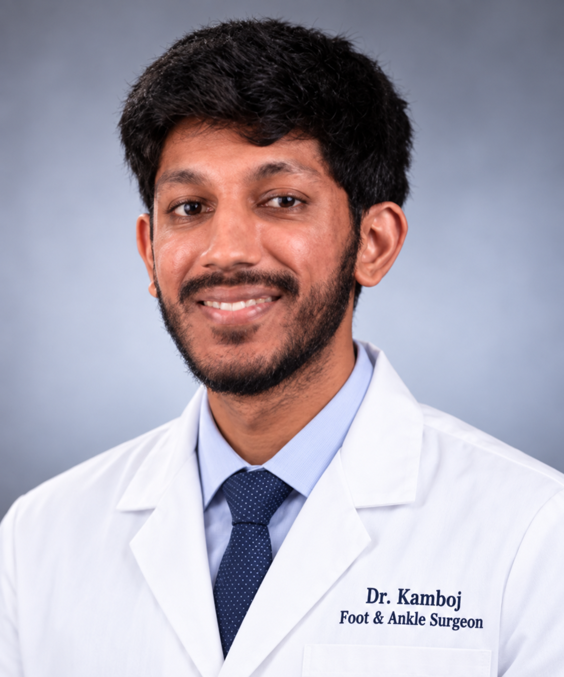 Dr. Jagir Kamboj in a white coat